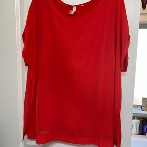 Women’s cute, tunic style top. Double layered with cuffed sleeves.